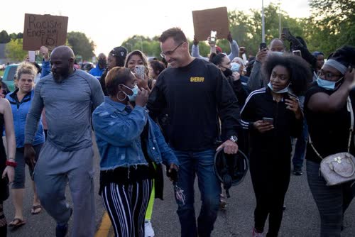 https://www.mlive.com/news/flint/2020/05/flint-area-police-join-protesters-marching-to-seek-justice-for-george-floyd.html
