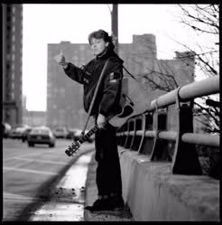 00-0-Copr_2024-TPL_Archives_Paul_pretending_to_hitchhike_to_Torontot.jpg